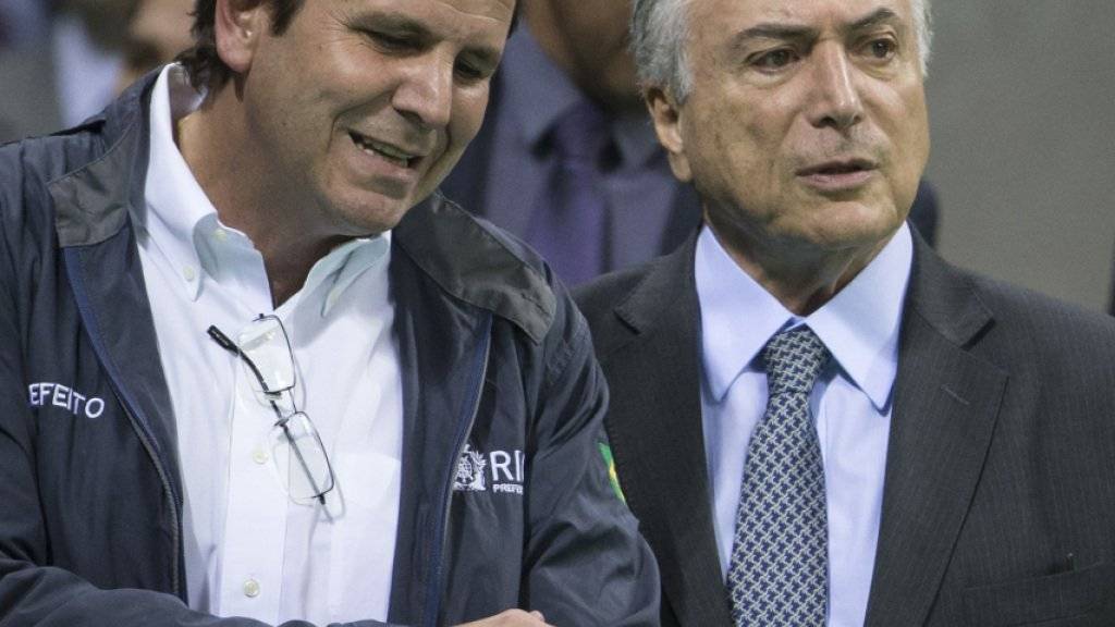Müssen grosse Herausforderungen meistern: Rios Bürgermeister Eduardo Paes (links) und Brasiliens Interimspräsident Michel Temer