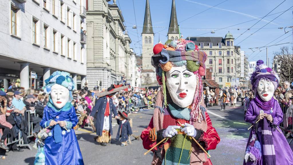 Masked revellers parade through the streets during the the carnival season in Lucerne, Switzerland, Monday, February 24, 2020. // Fasnacht Luzern // Lozärner Fasnacht