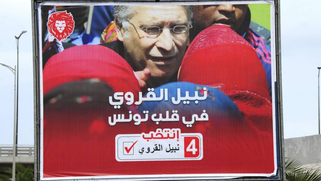 Wahlplakat für Nabil Karoui - der aussichtsreiche tunesische Präsidentschaftskandidat muss jedoch im Gefängnis bleiben.