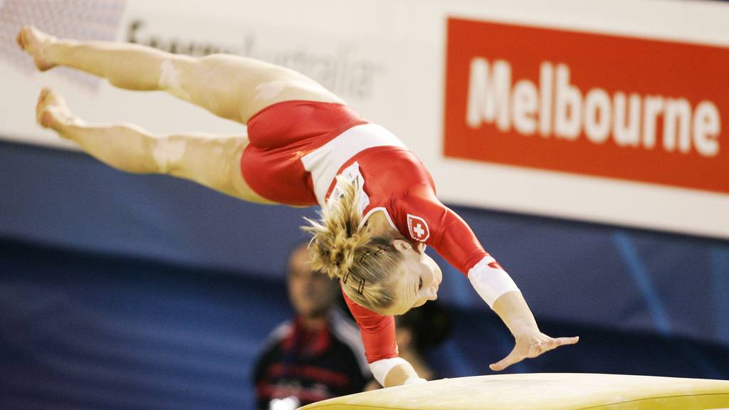 Ariella Kaeslin of Switzerland makes a vault during women's qualifying at the World Gymnastics Championships in Melbourne, Australia, Wednesday, Nov. 23, 2005. There are 275 gymnasts competing in this year's world championships.