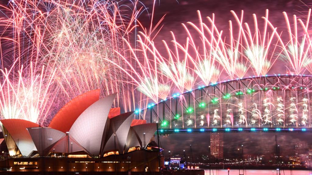 Fireworks are seen over the Sydney Opera House and Harbour Bridge during New Years Eve celebrations in Sydney, Monday, January 1, 2024. (AAP Image/Dan Himbrechts) NO ARCHIVING