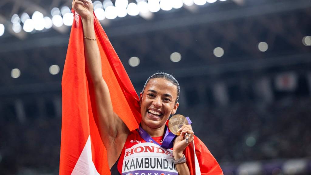 Ditaji Kambundji strahlt nach ihrem Gold-Coup an der WM in Tokio