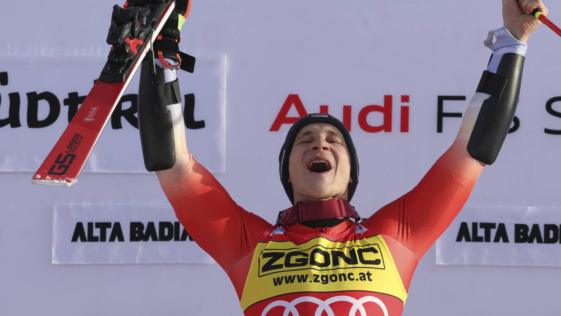 The winner, Switzerland's Marco Odermatt celebrates after an alpine ski, men's World Cup giant slalom, in Alta Badia, Italy, Monday, Dec. 19, 2022.