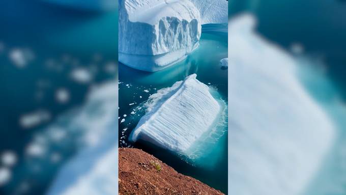 Gewaltige Bilder: Eisberg kippt im Osten Grönlands