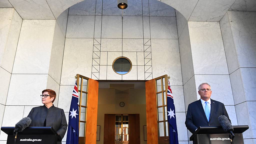 Minister for Foreign Affairs Marise Payne and Prime Minister Scott Morrison address the media at a press conference at Parliament House in Canberra, Monday, March 29, 2021. (AAP Image/Mick Tsikas) NO ARCHIVING