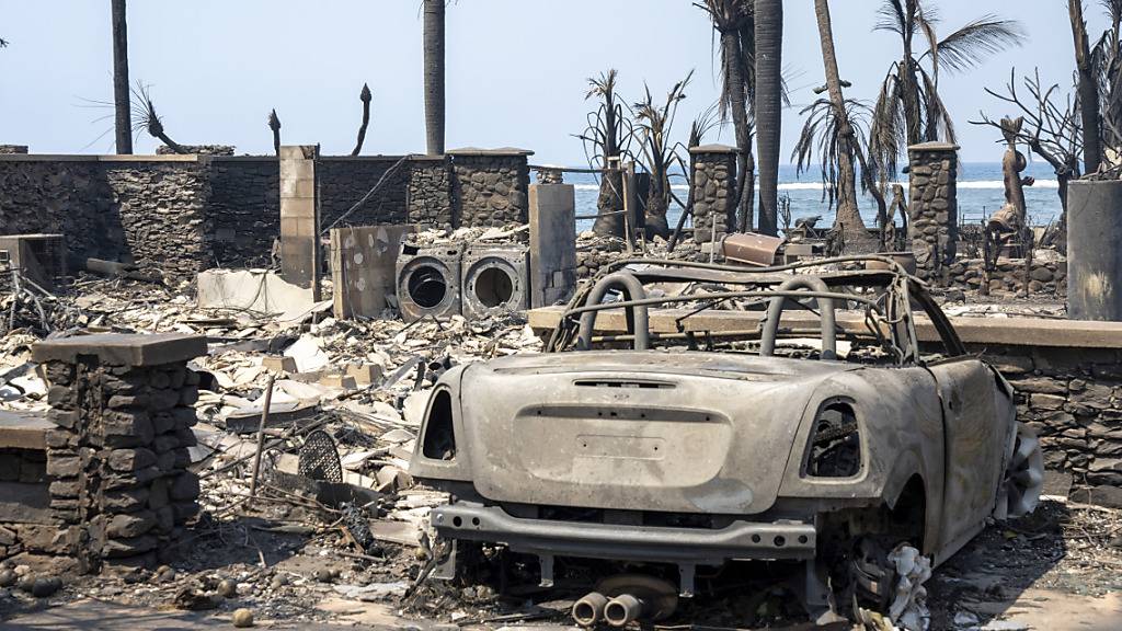 HANDOUT - Die Trümmer des Waldbrandes sind in Lahaina, Hawaii, zu sehen. Foto: Tiffany Kidder Winn/via AP/dpa - ACHTUNG: Nur zur redaktionellen Verwendung und nur mit vollständiger Nennung des vorstehenden Credits bis zum 25. August 2023.