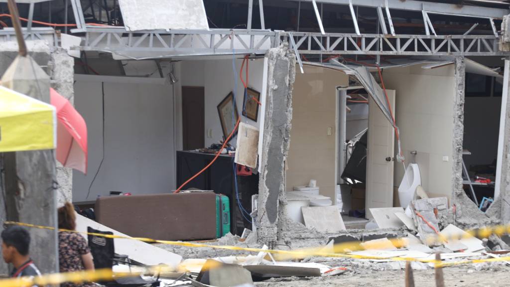 Beschädigtes Haus im Süden der Philippinen. Foto: Manman Dejeto/AP/dpa