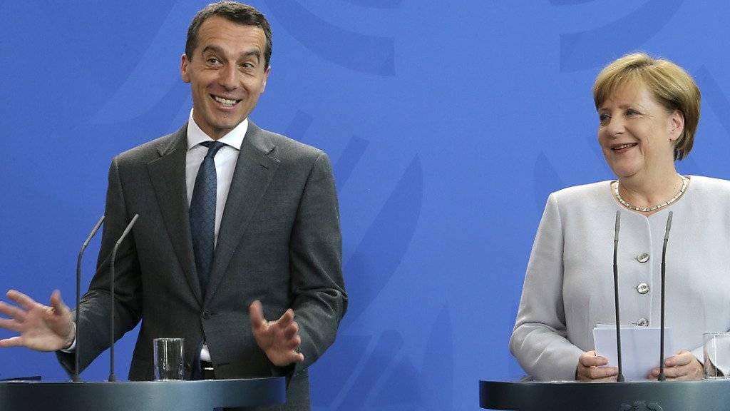 Verstehen sich: Österreichs neuer Kanzler Kern und die deutsche Kanzlerin Merkel.