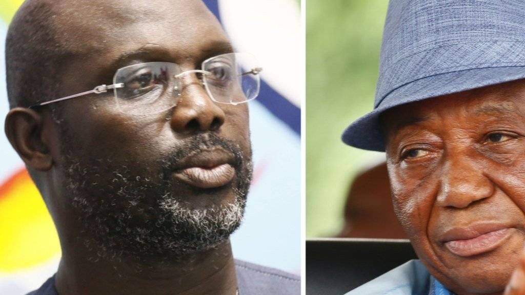 Sehr ungleiche Rivalen streiten sich um das liberianische Präsidentenamt: Der frühere Fussballstar George Weah (links) und der bisherige Vizepräsident und Vertreter der Regierungspartei UP, Joseph Boakai.