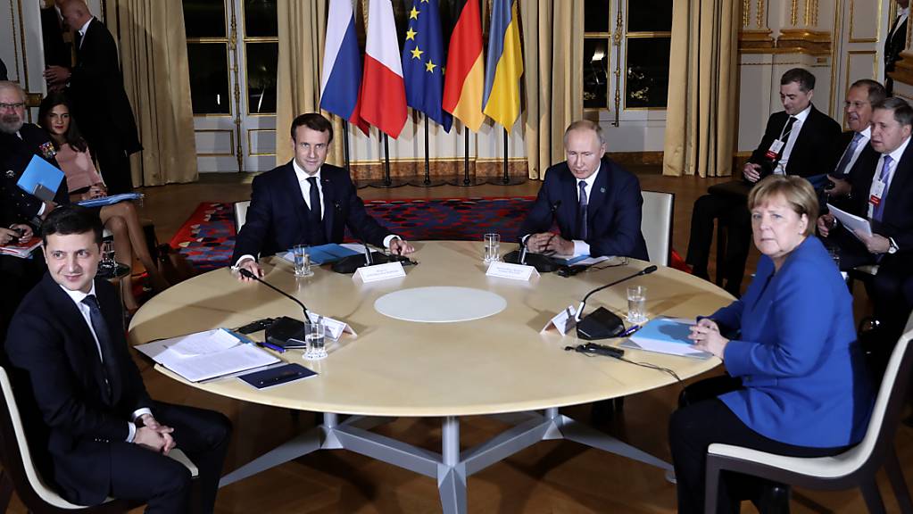 Der französische Präsident Emmanuel Macron hat im Elysée-Palast den ukrainischen Präsidenten Wolodymyr Selenskyj, die deutsche Kanzlerin Angela Merkel und den russischen Präsidenten Wladimir Putin zum Ukraine-Gipfel empfangen.