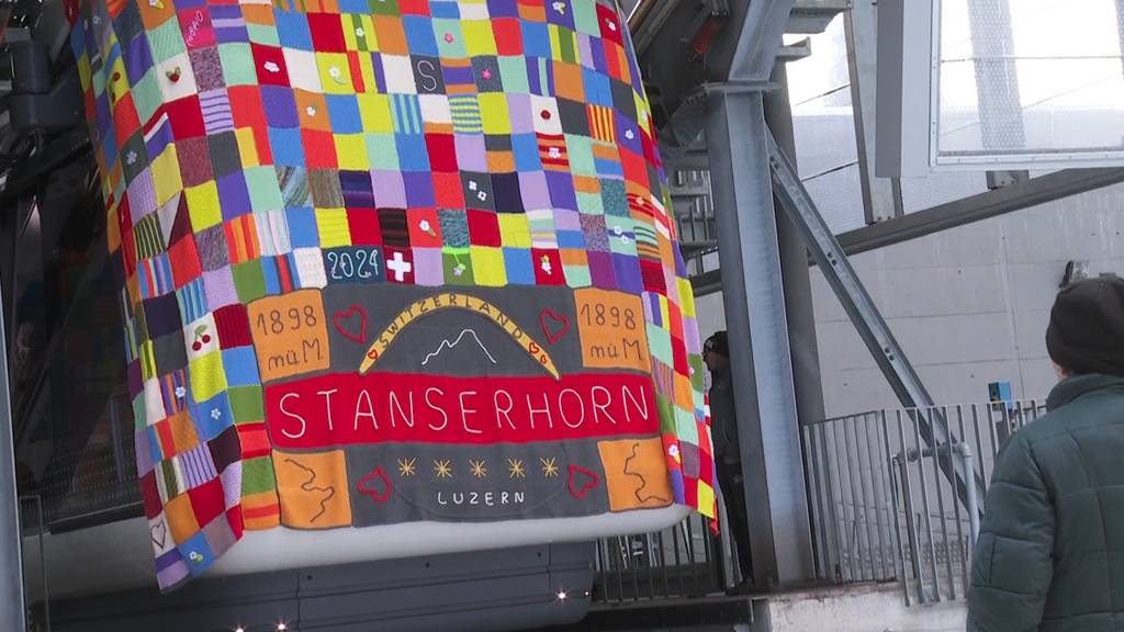 Stanserhornbahn wird in eine Wolldecke gepackt