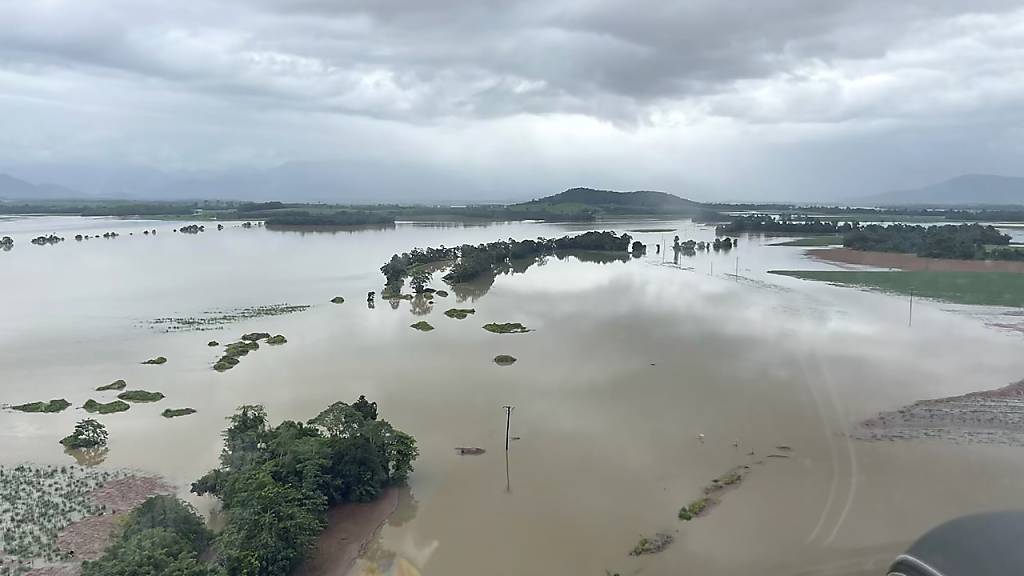 A supplied image obtained on Monday, December 18, 2023, shows flooding in Tully, Queensland following heavy rain and flooding from ex-tropical cyclone Jasper. (AAP Image/Supplied by Ergon Energy) NO ARCHIVING, EDITORIAL USE ONLY