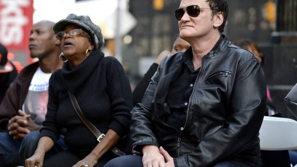 Gewalt im Film? Kein Problem für Quentin Tarantino (r). In der Realität aber schon: Am Donnerstag nahm er an einer Demo gegen Polizeigewalt teil.