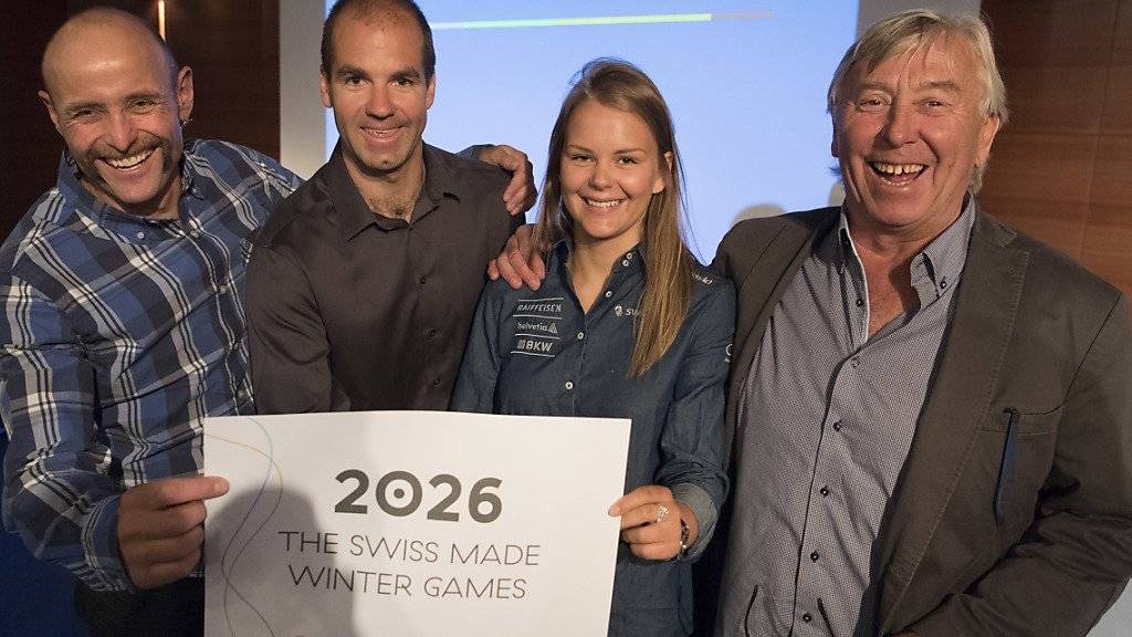 Die Sportler William Besse, Didier Defago, Charlotte Chable et Roland Collombin (v.l.n.r.) werben am Donnerstag in Lausanne für die Westschweizer Kandidatur olympischen Winterspiele 2026.
