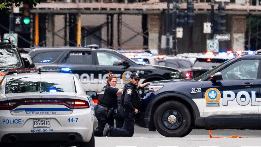 Die Polizei von Montreal ist am Tatort einer Schießerei in Montreal im Einsatz. Foto: Christopher Katsarov/The Canadian Press/AP/dpa