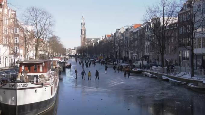 Eislauf-Spass in Amsterdam: Kältewelle lässt Kanäle zufrieren