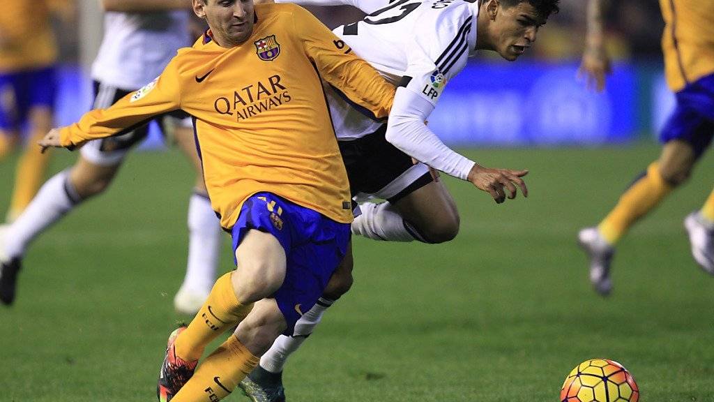 Valencia bremste Lionel Messi (links) und den FC Barcelona