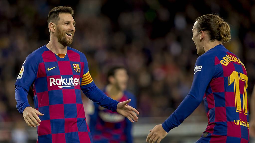 Zwei Torschützen freuen sich: Lionel Messi (links) und Antoine Griezmann