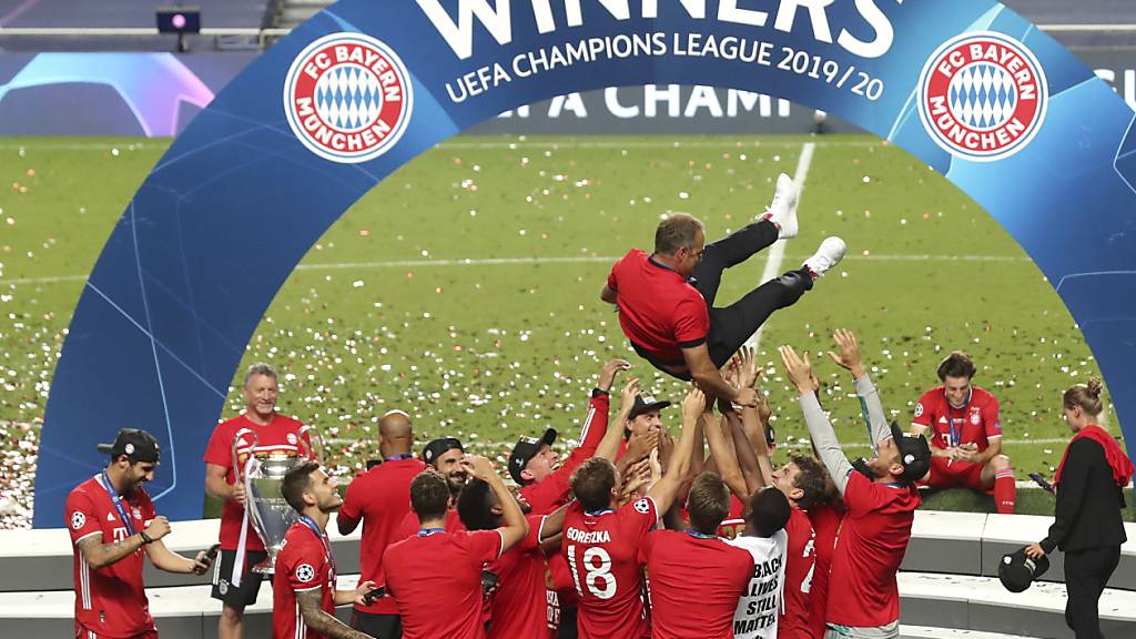 Steigen als Titelverteidiger in die neue Champions-League-Saison: Bayern München und sein Coach Hansi Flick