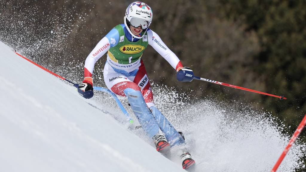 Switzerland's Michelle Gisin speeds down the course during an alpine ski, women's World Cup slalom, in Courchevel, France, Saturday, March 19, 2022.