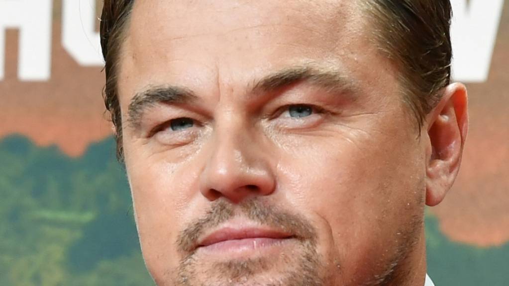 ARCHIV - Schauspieler Leonardo DiCaprio kommt zur Premiere des Films «Once Upon a Time... in Hollywood» in das Kino Cinestar. Foto: Jens Kalaene/dpa-Zentralbild/dpa