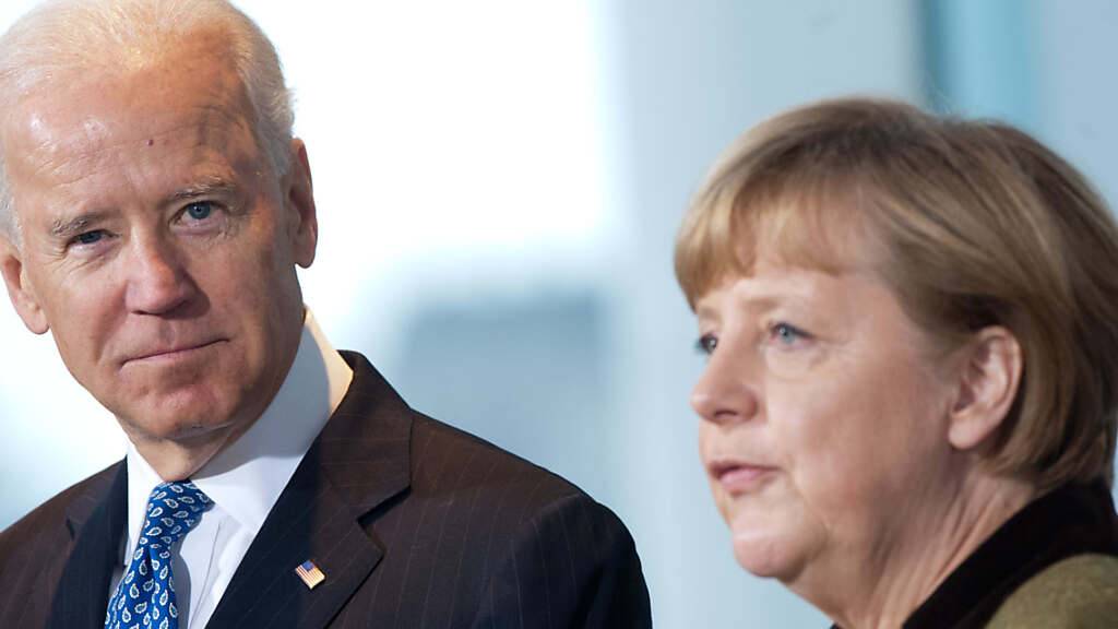 ARCHIV - Bundeskanzlerin Angela Merkel (CDU) empfängt den damaligen US-Vizepräsidenten Joe Biden. Foto: Maurizio Gambarini/Archiv/dpa