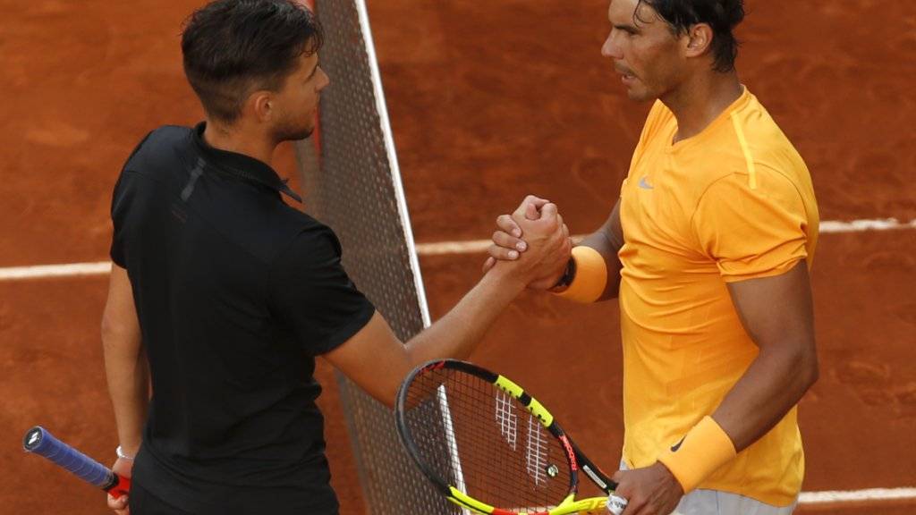 Rafael Nadal (rechts) kann in Rom nicht auf Dominic Thiem treffen: Der Österreicher scheiterte bereits in der 2. Runde