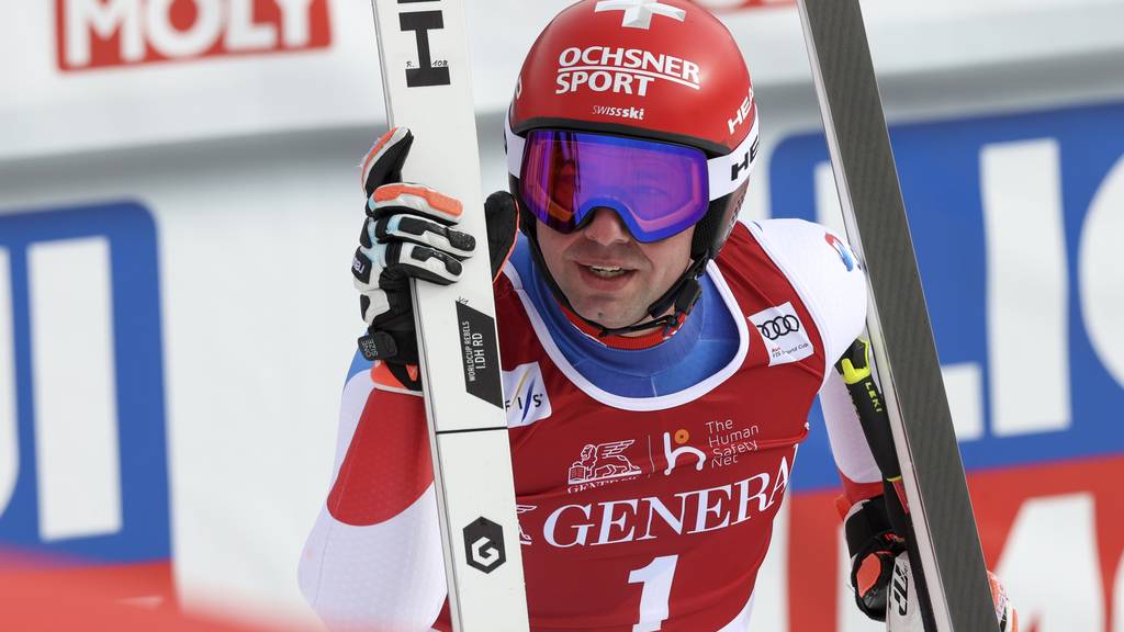 Switzerland's Beat Feuz looks on in the finish area area of an alpine ski, men's World Cup Finals downhill, in Courchevel, France, Wednesday, March 16, 2022.