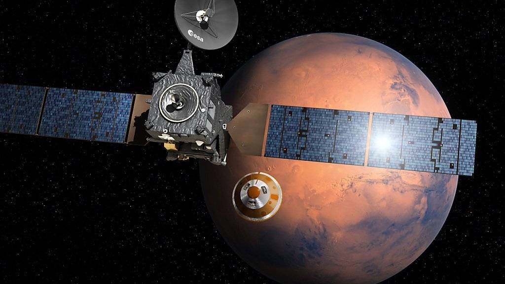 Am Sonntag hat sich das Landemodul «Schiaparelli» vom TGO abgekoppelt und soll am Mittwoch auf der Marsoberfläche aufsetzen. (Illustration)