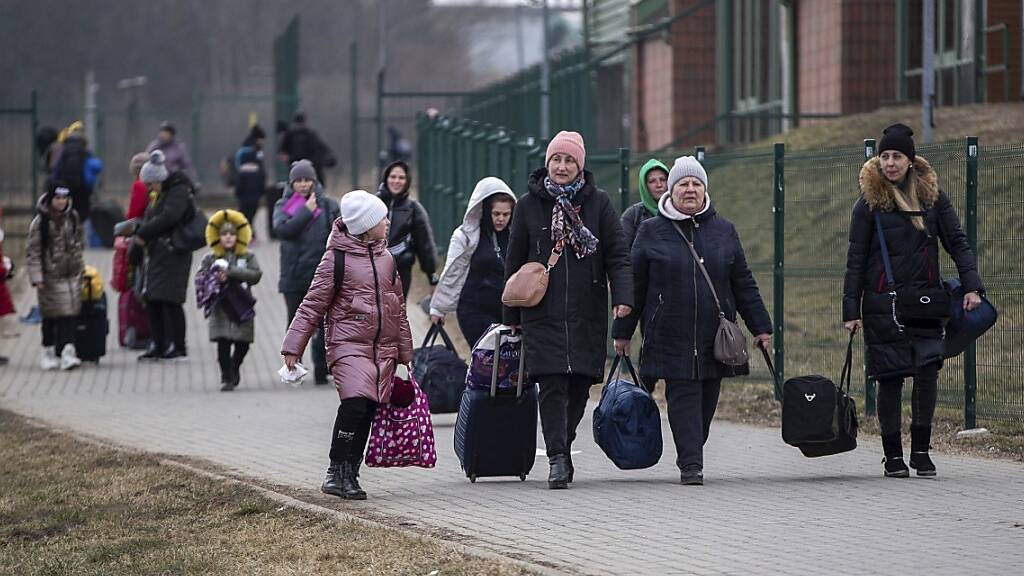 Der leidenden Bevölkerung der Ukraine gilt der nationale Solidaritätstag: Flüchtlinge am polnischen Grenzübergang Medyka.