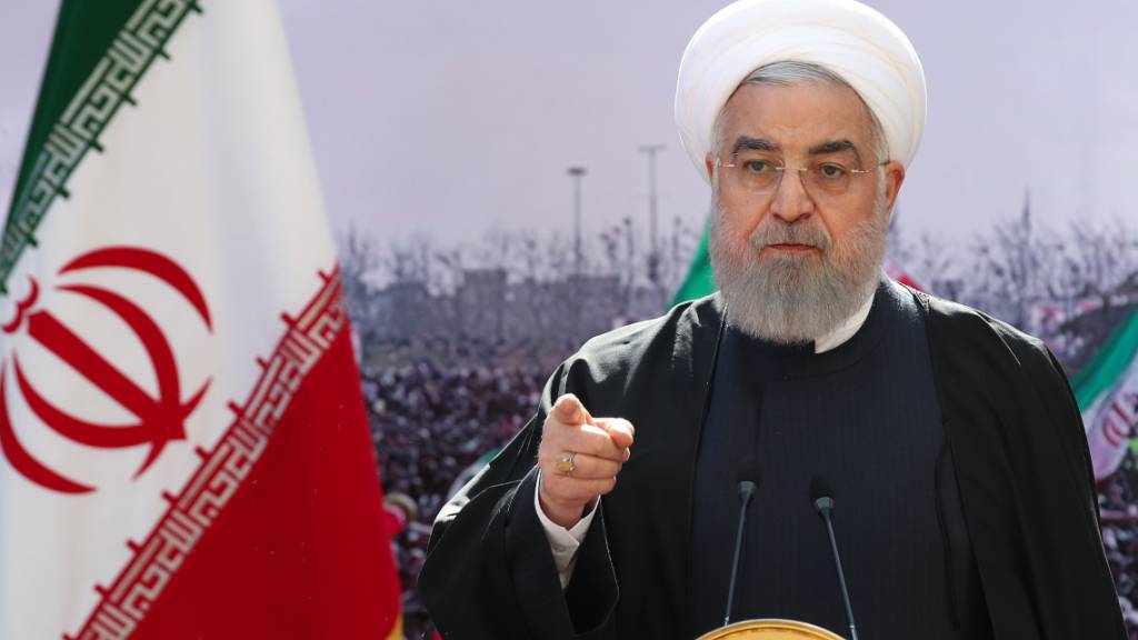 HANDOUT - Hassan Ruhani, Präsident des Iran, spricht während einer Zeremonie anlässlich des 42. Jahrestages der Islamischen Revolution. Foto: -/Iranian Presidency/dpa - ATTENTION: editorial use only and only if the credit mentioned above is referenced in full