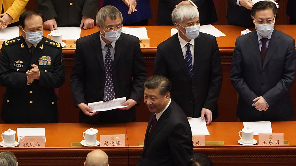 Der Präsident von China und Generalsekretär der Kommunistischen Partei, Xi Jinping, bei der Abschlusssitzung der Politischen Konsultativkonferenz des chinesischen Volkes. Foto: Mark Schiefelbein/AP/dpa