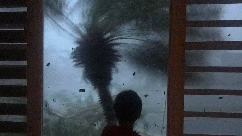 Das am meisten von Wetterkatastrophen gefährdete Land der Welt: Blick aus einem Fenster auf den Hurrikan Maria im September