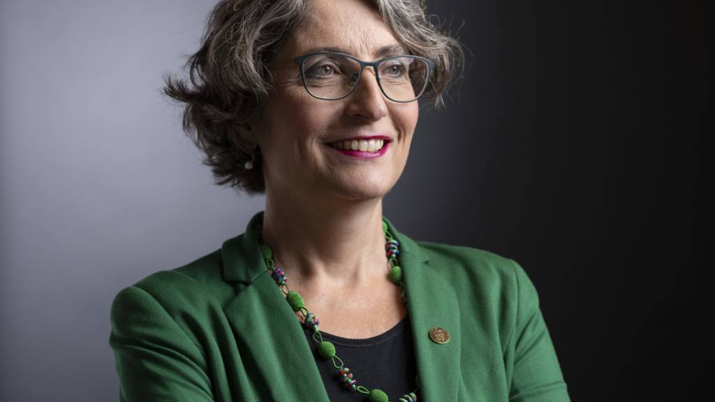 Manuela Weichelt-Picard (Grüne), Gerhard Pfister (Mitte) und Thomas Aeschi (SVP) sind wieder in den Nationalrats gewählt worden. (KEYSTONE/Gaetan Bally)