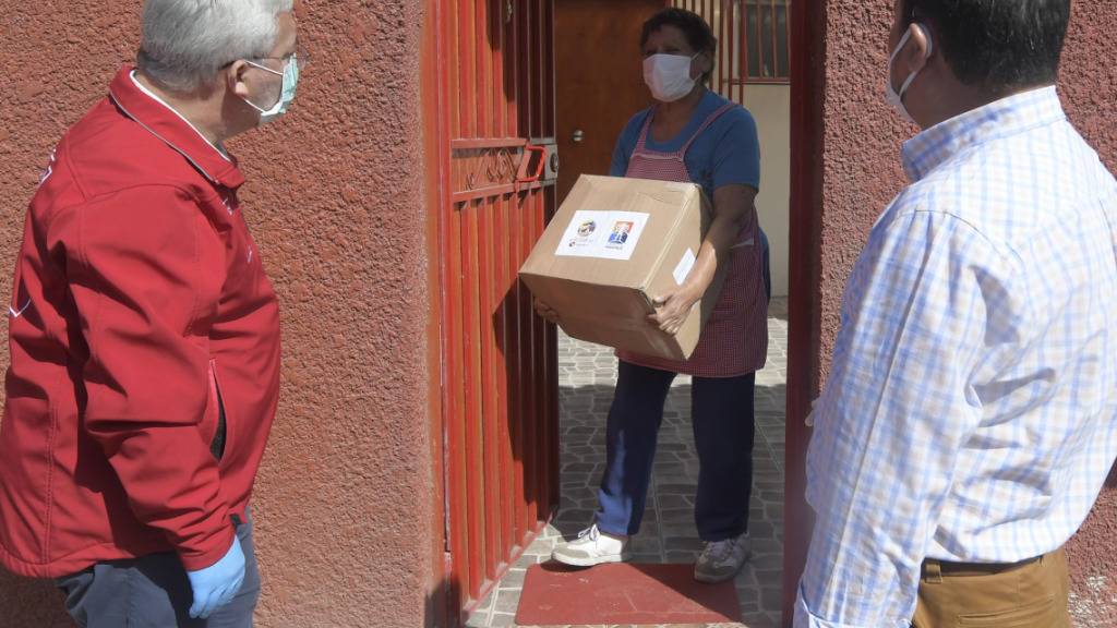 Chile verteilt Zehntausende Lebensmittelpakete