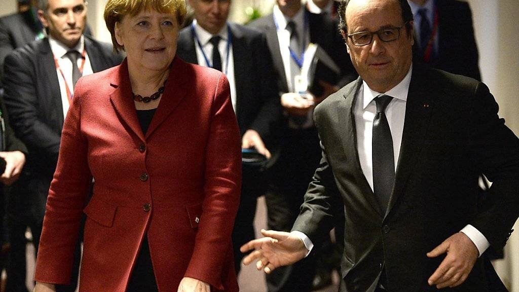 Die deutsche Kanzlerin Angela Merkel (links) mit dem französischen Präsidenten François Hollande: Merkel
zeigte sich vor Gipfelbeginn «vorsichtig optimistisch», dass sich die 28-EU-Staaten im Abkommen mit der Türkei einigen können.