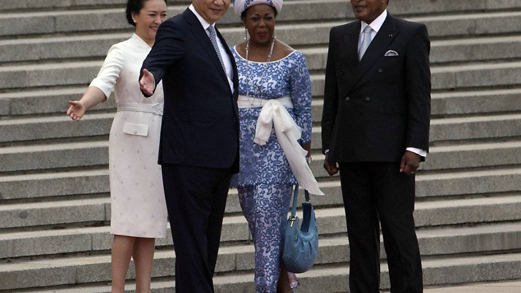 Die Regierung des langjährigen Präsidenten in Kongo Denis Sassou-Nguesso (rechts) hat einen Waffenstillstand mit Rebellen des Landes vereinbart. (Archivbild vom Staatsbesuch in China im Jahr 2016)