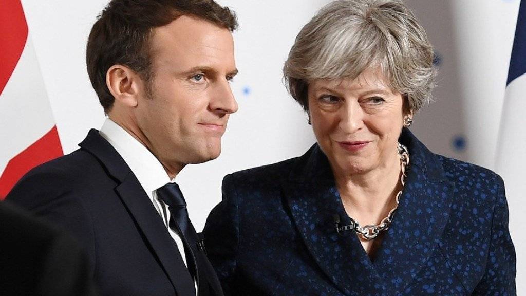 Theresa May und Emmanuel Macron am Donnerstag bei ihrem Treffen in Sandhurst westlich von London.
