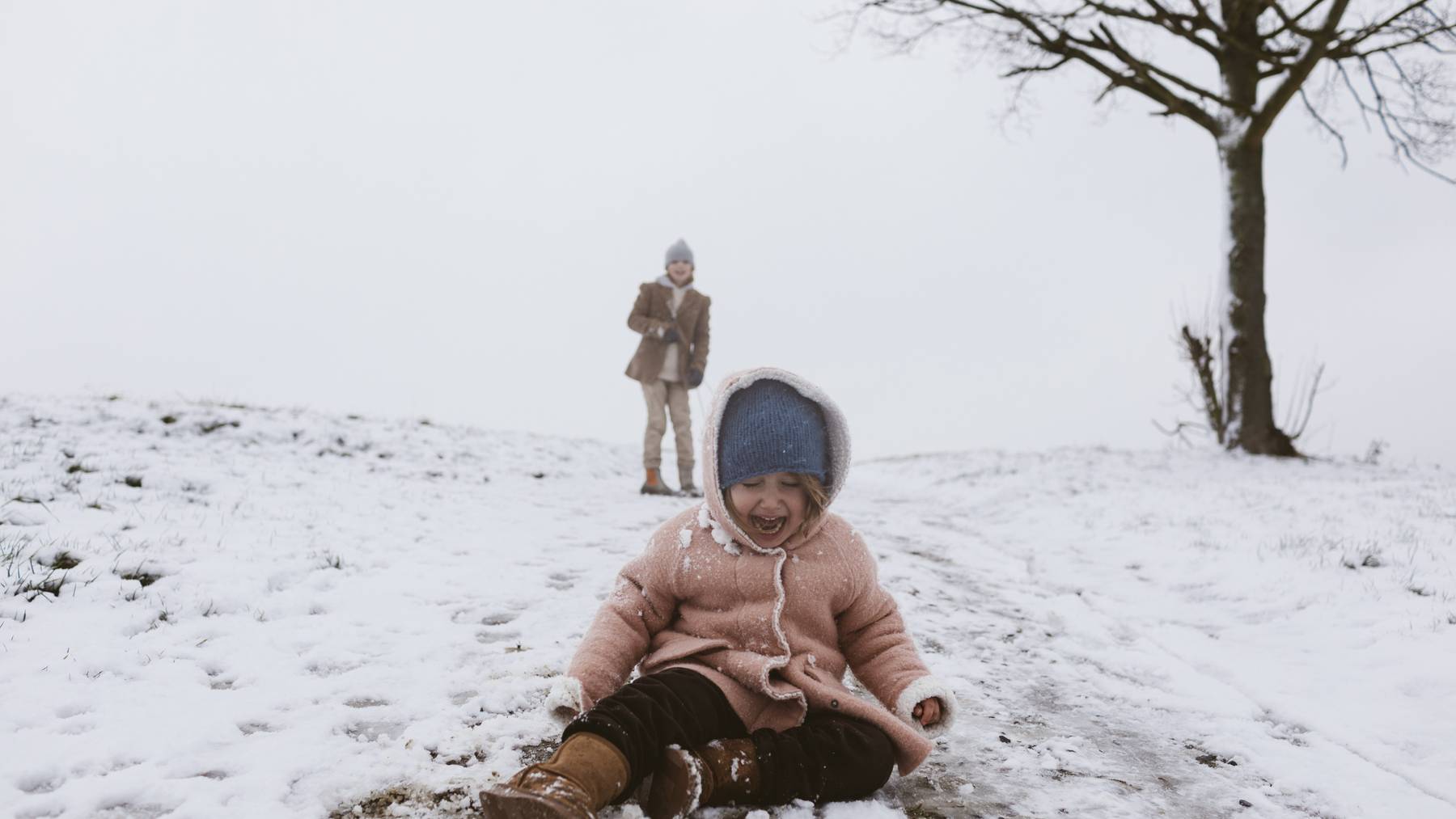 Kind im Schnee (Symbolbild)