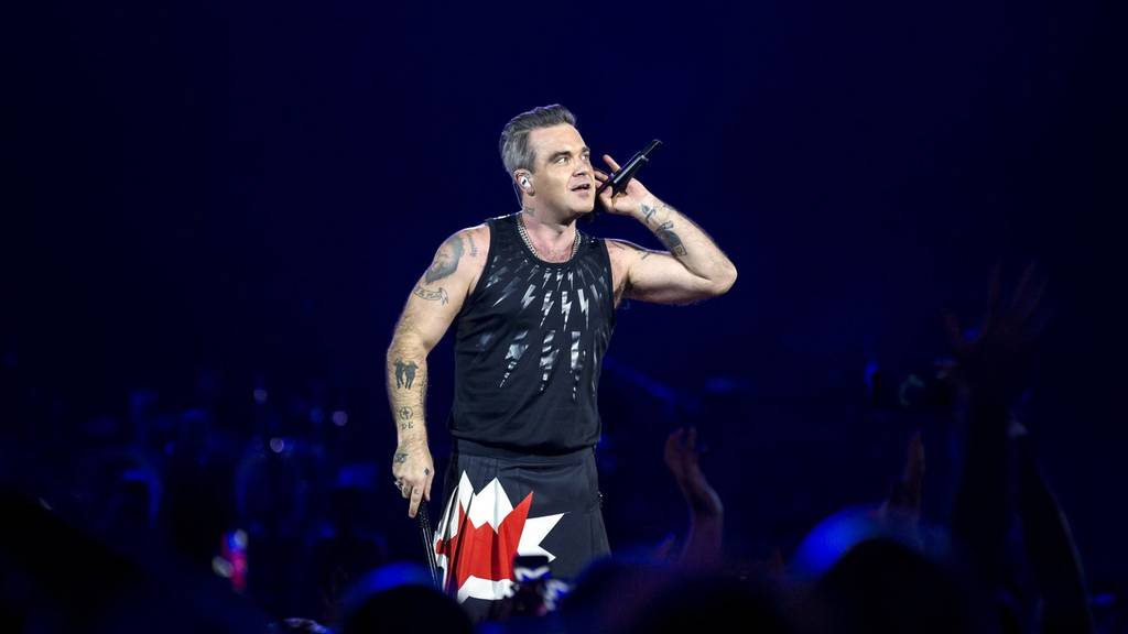 Quiz: Erkennst du die kultigsten Musikvideos von Robbie Williams?
