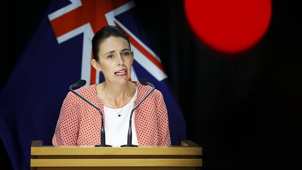 New Zealand Prime Minister Jacinda Ardern speaks to the media during a press conference at Parliament in Wellington, New Zealand, Sunday, January 23, 2022. The prime minister announced that New Zealand will be moving to the red traffic light setting at 11.59pm tonight after nine cases reported in Nelson/Marlborough region were discovered to have the Omicron variant. (AAP Image/Pool, Hagen Hopkins) NO ARCHIVING