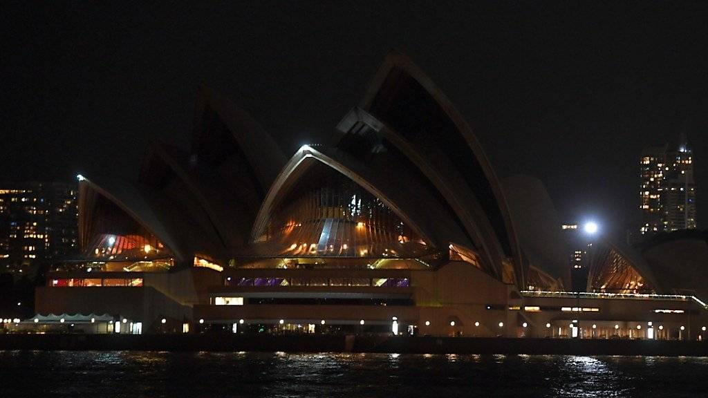 Im Dunkeln: Für die Aktion «Earth Hour» wurde die Beleuchtung des Opernhauses in Sydney ausgeschaltet.