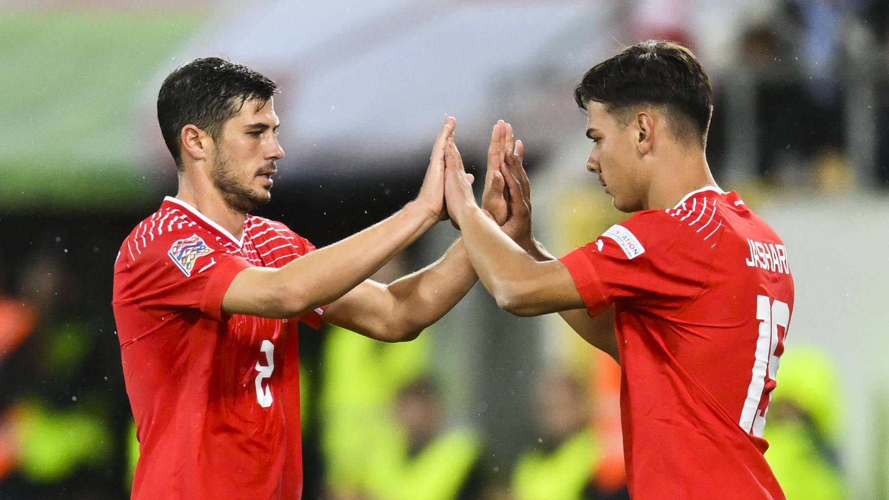 Switzerland's midfielder Remo Freuler, left, and substitute player Ardon Jashari during the UEFA Nations League group A2 soccer match between Switzerland and Czech Republic, on Tuesday, September 27, 2022, at the Kybunpark stadium, in St. Gallen, Switzerland.