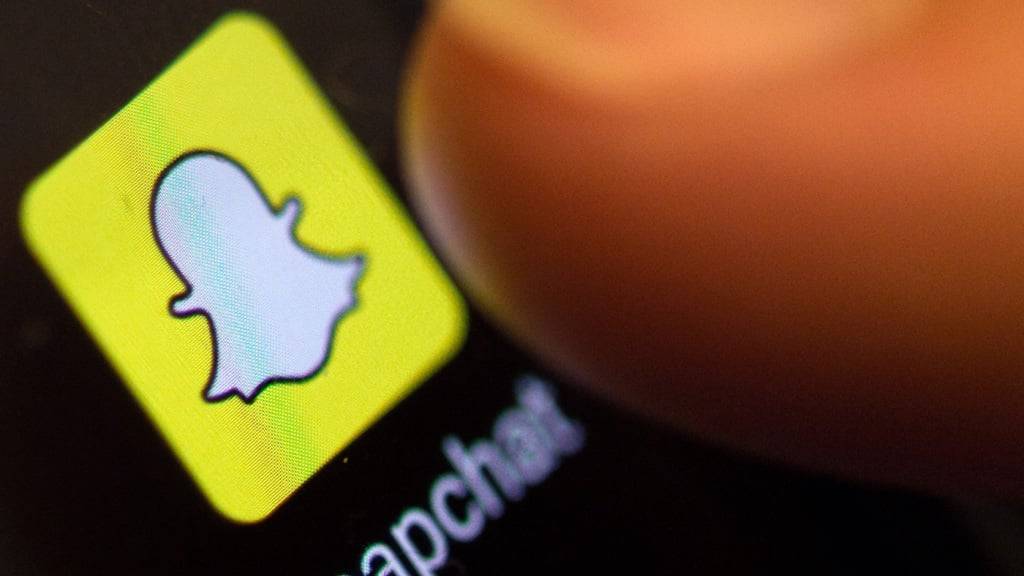 ARCHIV - Das Icon von Snapchat ist auf einem Smartphone Samsung S5 auf dem Display zu sehen. Foto: Patrick Seeger/dpa