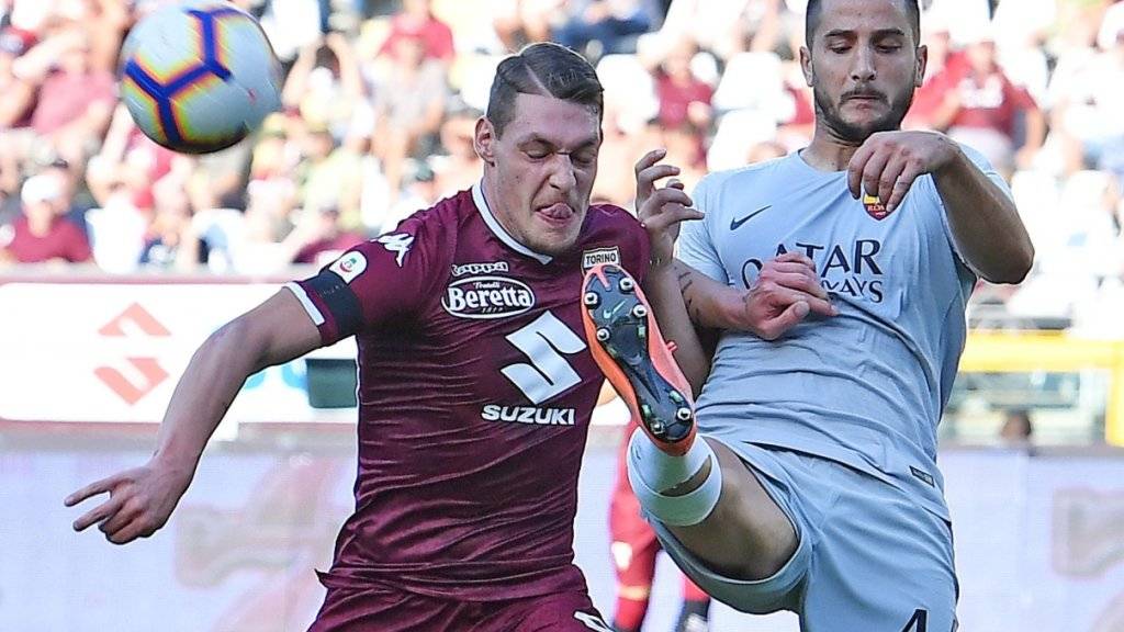 Zweikampf zwischen Romas Verteidiger Manolas (rechts) und Torino-Stürmer Belotti