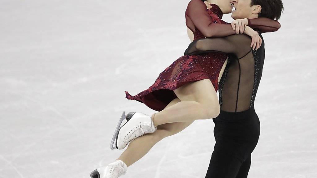 Das Eistanz-Paar Scott Moir and Tessa Virtue holt mit den kanadischen Kollegen Gold im Mannschafts-Wettkampf