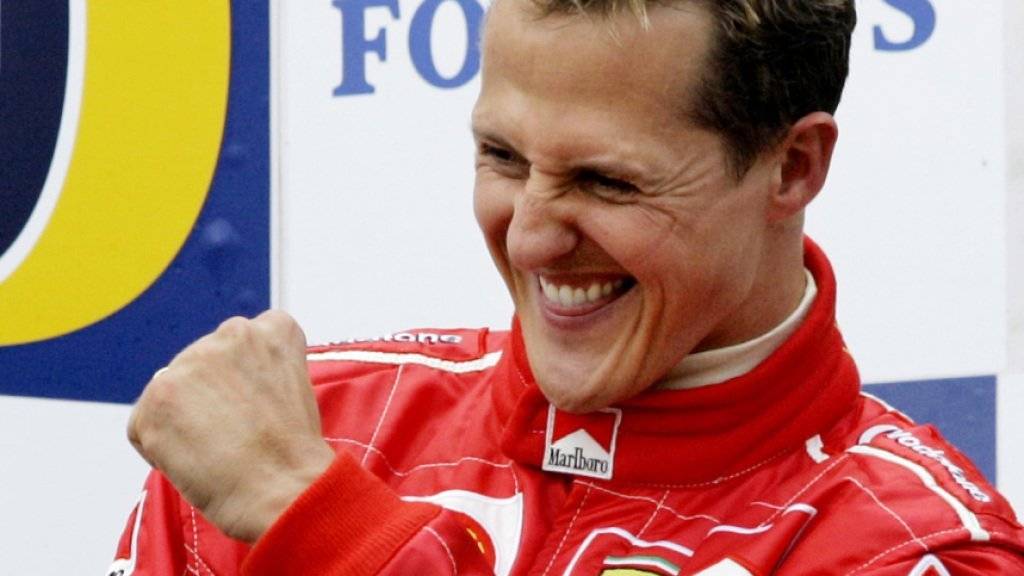 29. August 2004 in Francorchamps: Michael Schumacher jubelt nach dem Gewinn seines siebten WM-Titels