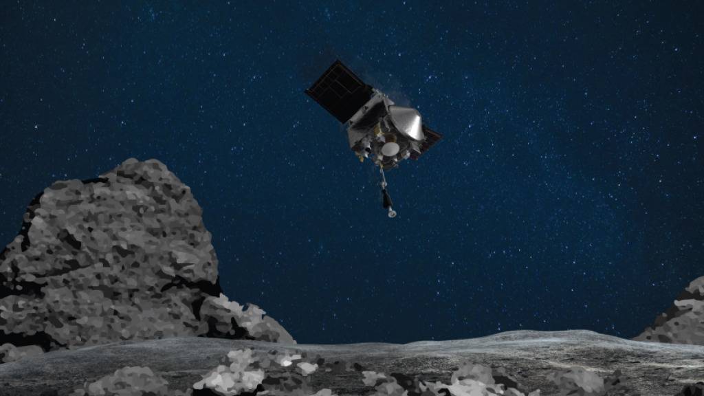 HANDOUT - So könnte es aussehen, wenn die Raumsonde «Osiris-Rex» sich dem Asteroiden Bennu nähert (künstlerische Darstellung). Foto: ---/Nasa/dpa - ACHTUNG: Nur zur redaktionellen Verwendung und nur mit vollständiger Nennung des vorstehenden Credits