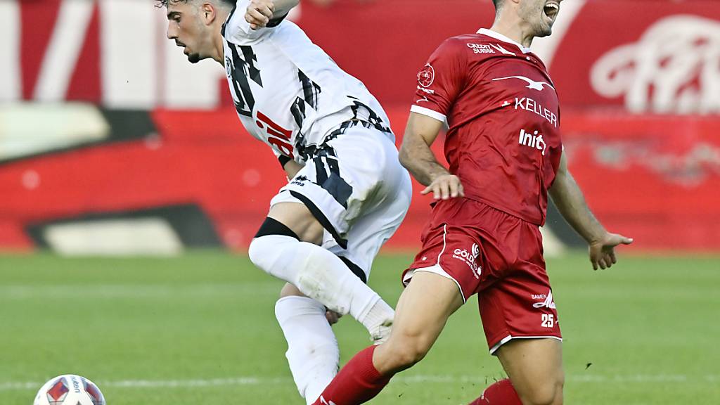 Shkelqim Vladi (im Duell mit Yannick Schmid) schoss für Lugano das 1:0