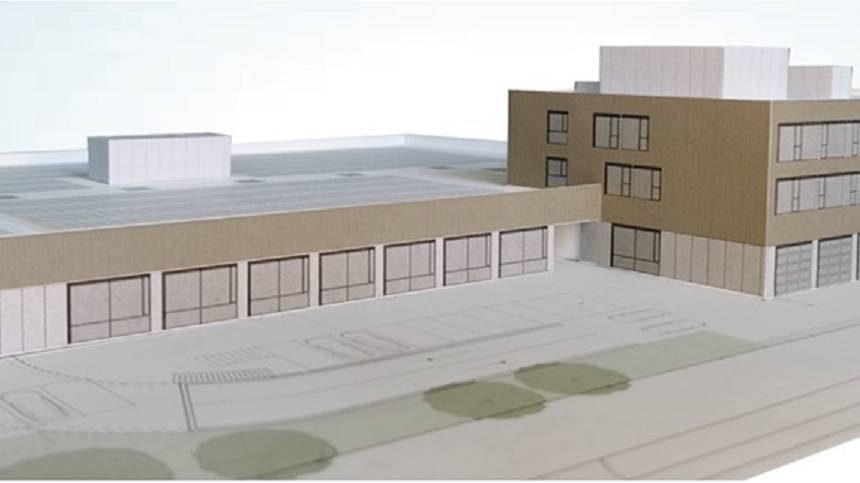Die Visualisierung zeigt das geplante eingeschossige Training Center sowie das Technical Service Center.